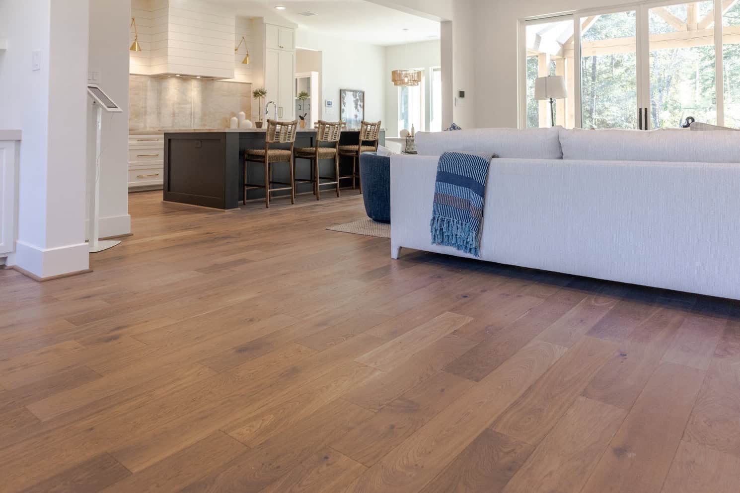 Warm wood-look flooring in an open-plan home